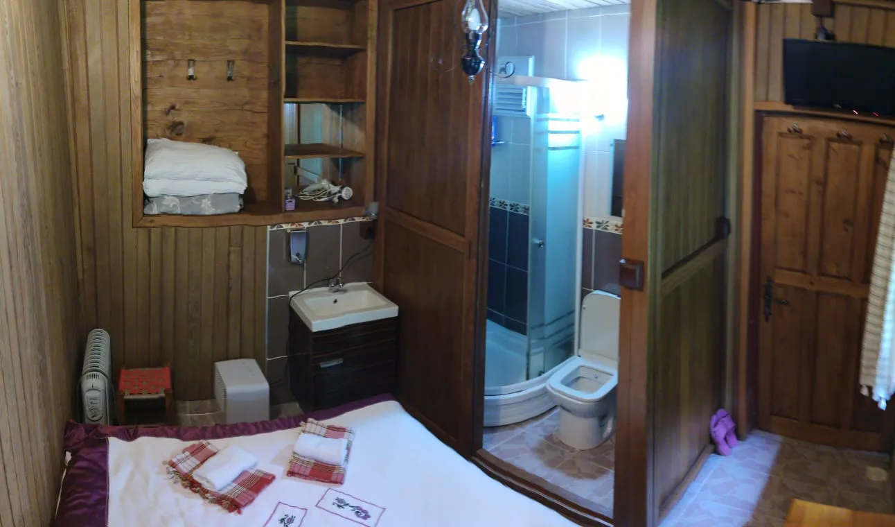 Mençuna Konakları kış görünümü - Karlı bungalovlar